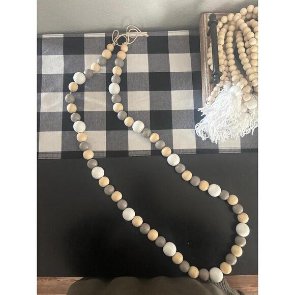 Bundle of Decorative wood beads. 3 light wood with white end tassles 46in length - Picture 2 of 3
